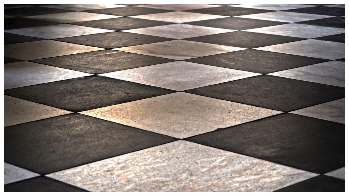 Black and white tiled kitchen floor