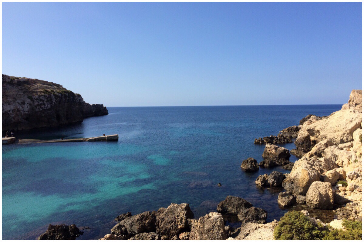 Anchor Bay - the view out to sea. Beautiful blue waters, jagged rocky cliffs and perfect blue sky