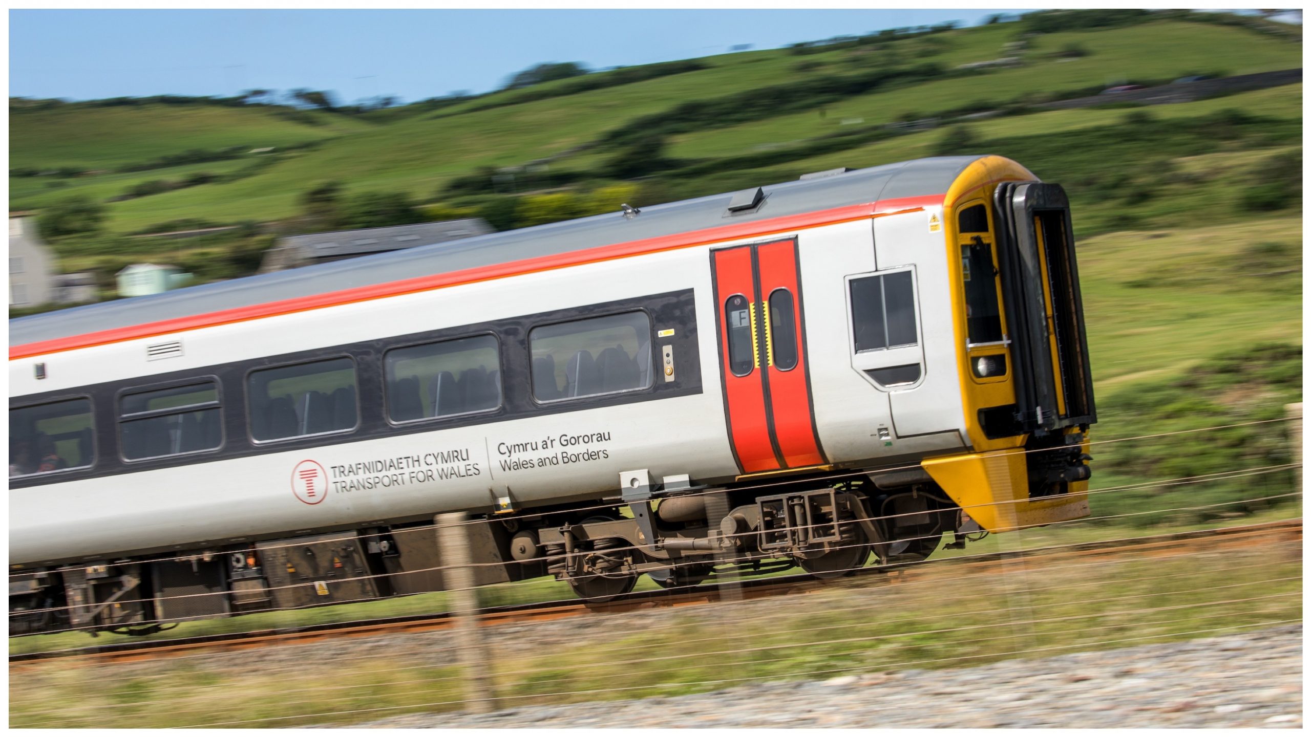 A Transport for Wales train along the Cambrian Coast Line