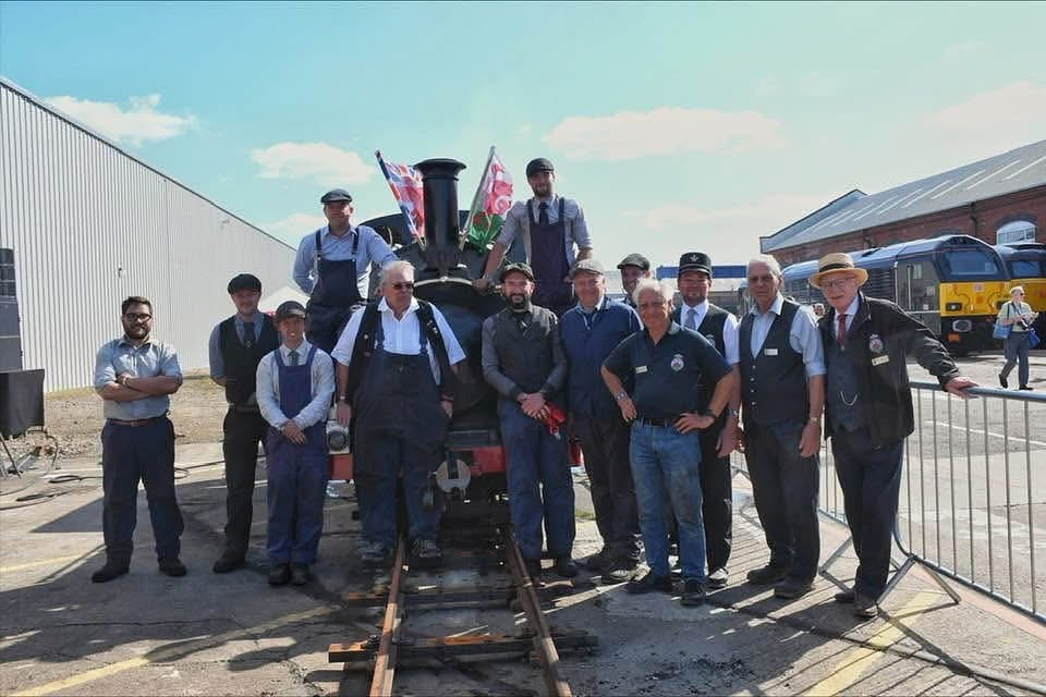 Group photo of some of the FWHR crew and volunteers at the Greatest Gathering