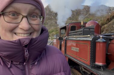 Rebecca selfie with David Lloyd George loco in the background during 2026 Victorian Weekend on the Ffestiniog Railway